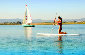 Woman practicing stand-up paddle